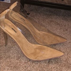 Clear pump heels. NEVER WORN JUST TRIED ON